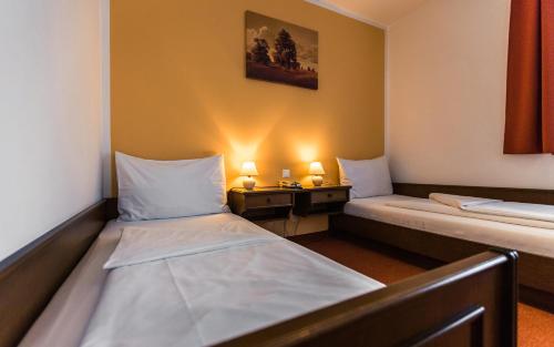 Imagen de la habitación del Hotel Restaurant Schwartz. Foto 15