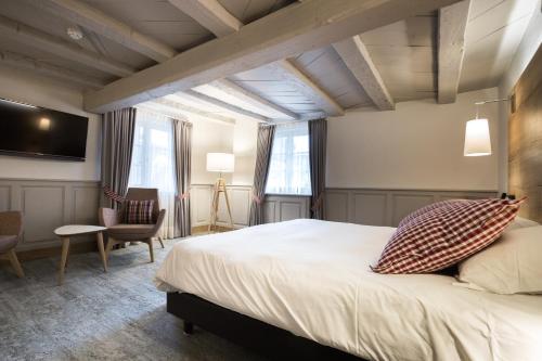 Imagen de la habitación del Hotel Restaurant Spa Cheval Blanc Lembach. Foto 7