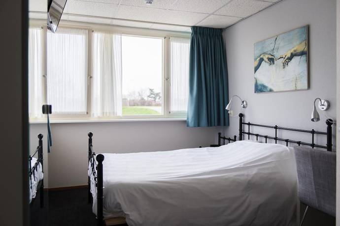 Imagen de la habitación del Hotel Restaurant Zalen Hoogeerd. Foto 9