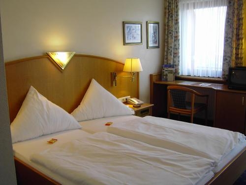 Imagen de la habitación del Hotel Restaurant and Hohenzollern. Foto 9