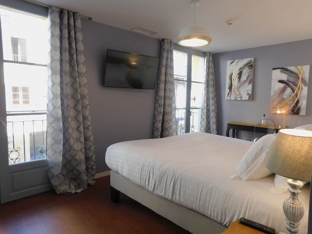 Imagen de la habitación del Hotel Restaurant des Augustins. Foto 10