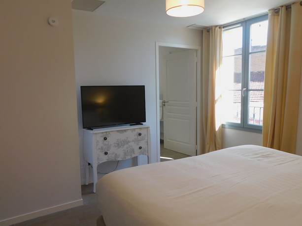 Imagen de la habitación del Hotel Restaurant des Augustins. Foto 19