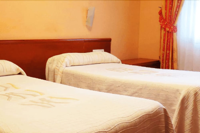 Imagen de la habitación del Hotel Restaurante América. Foto 14