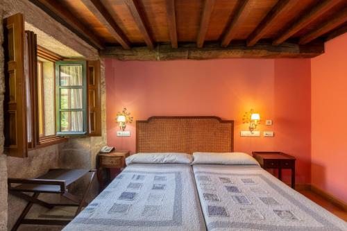 Imagen de la habitación del Hotel Restaurante Asador De Roxos Casa De Albardonedo. Foto 5