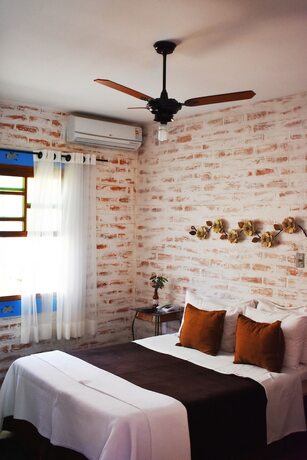 Imagen de la habitación del Hotel Restaurante Pousada Cachoeiras Da Furna. Foto 25