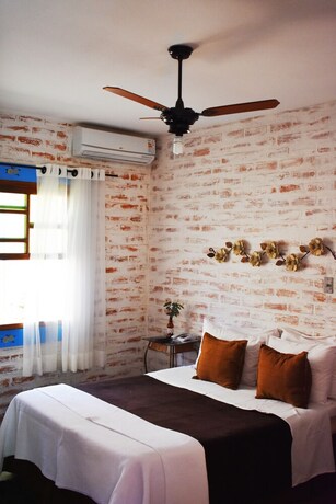 Imagen de la habitación del Hotel Restaurante Pousada Cachoeiras Da Furna. Foto 26