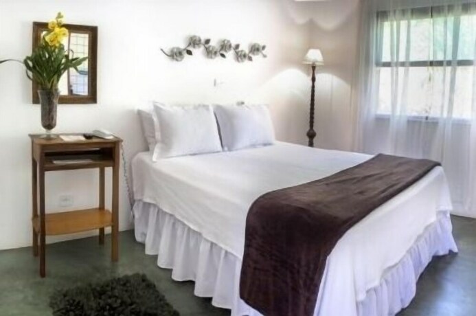 Imagen de la habitación del Hotel Restaurante Pousada Cachoeiras Da Furna. Foto 27