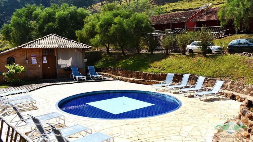 Imagen de la piscina del Hotel Restaurante Pousada Cachoeiras Da Furna. Foto 37
