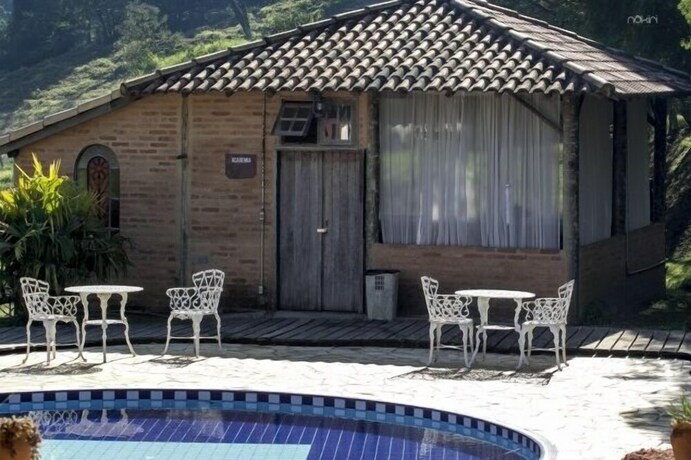 Imagen de la piscina del Hotel Restaurante Pousada Cachoeiras Da Furna. Foto 38