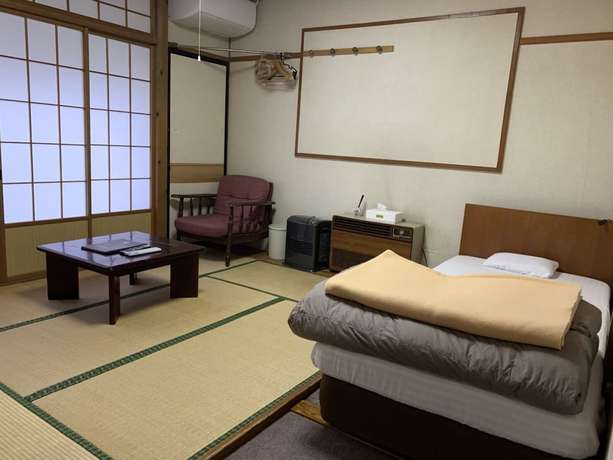 Imagen de la habitación del Hotel Restmance Pension Woody Hill. Foto 6