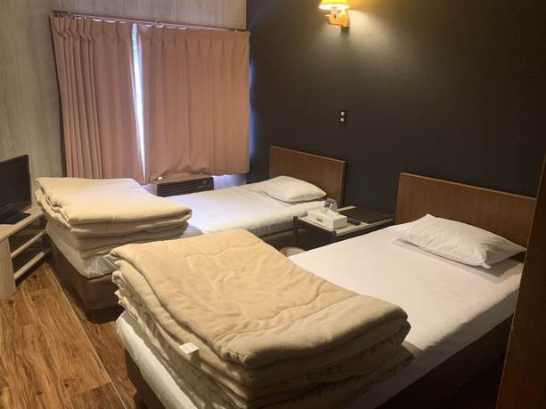 Imagen de la habitación del Hotel Restmance Pension Woody Hill. Foto 7