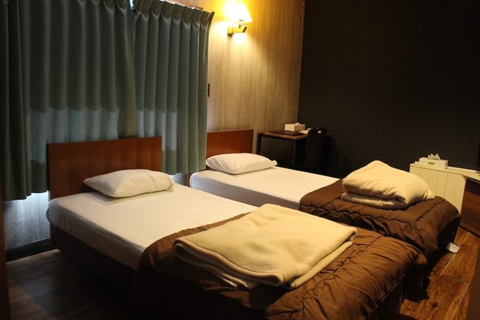 Imagen de la habitación del Hotel Restmance Pension Woody Hill. Foto 9