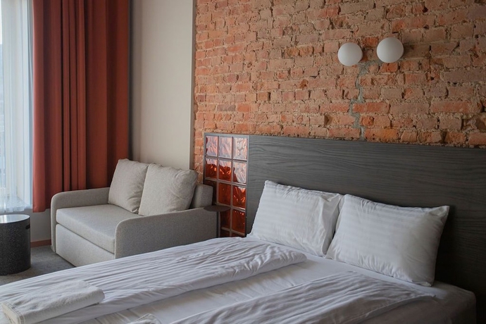 Imagen de la habitación del Hotel Resume Apartments. Foto 14