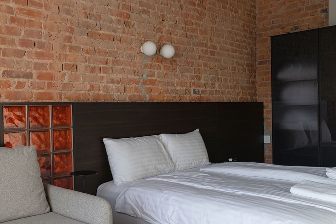 Imagen de la habitación del Hotel Resume Apartments. Foto 18