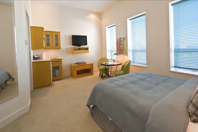 Imagen de la habitación del Hotel Retro Suites. Foto 16