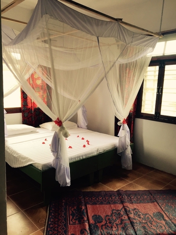 Imagen de la habitación del Hotel Retro, Zanzibar Ciudad. Foto 7