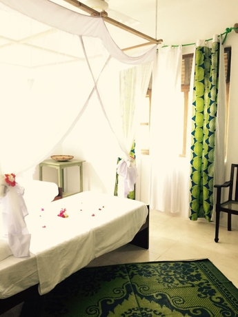 Imagen de la habitación del Hotel Retro, Zanzibar Ciudad. Foto 12