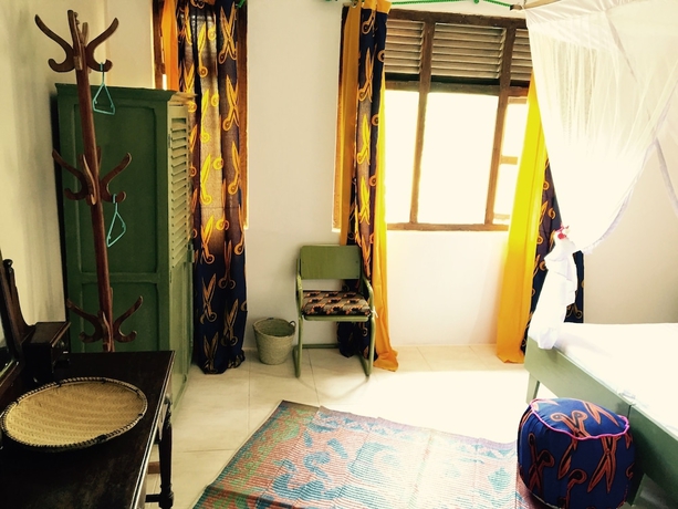 Imagen de la habitación del Hotel Retro, Zanzibar Ciudad. Foto 13