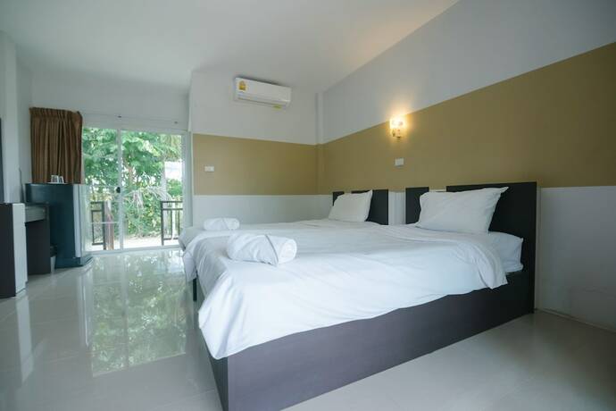 Imagen de la habitación del Hotel Reuan Chom Dao Resort. Foto 17