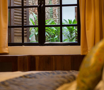 Imagen de la habitación del Hotel Reunion Heritage House. Foto 4