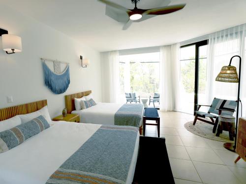 Imagen de la habitación del Hotel Reunion and Wellness Center. Foto 15