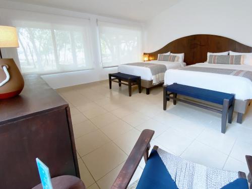 Imagen de la habitación del Hotel Reunion and Wellness Center. Foto 16