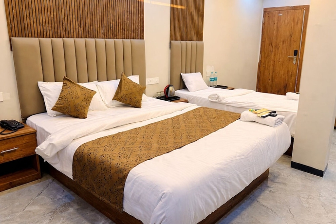 Imagen de la habitación del Hotel Revelon Grand Hotel. Foto 2