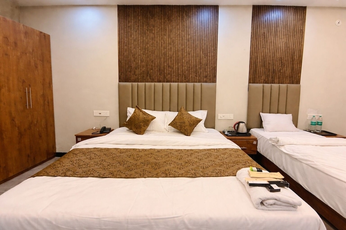 Imagen de la habitación del Hotel Revelon Grand Hotel. Foto 3