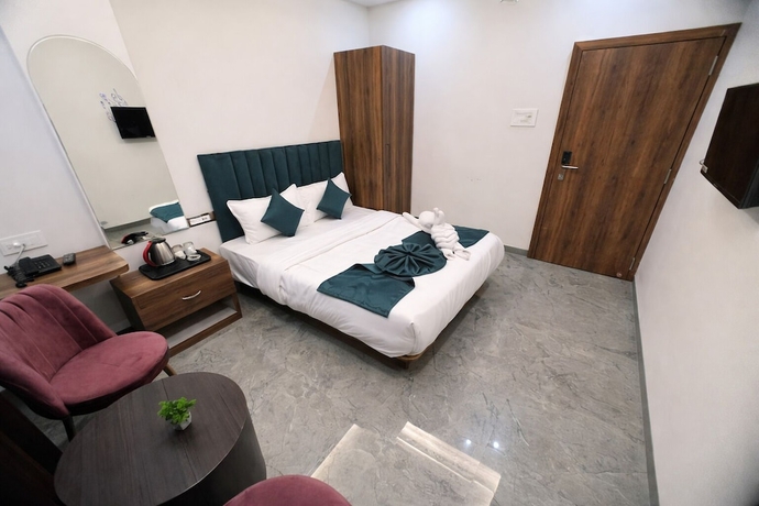 Imagen de la habitación del Hotel Revelon Grand Hotel. Foto 5