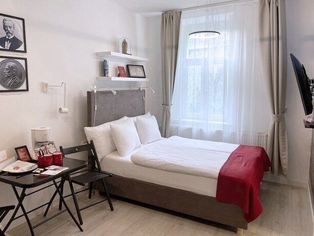 Imagen de la habitación del Hotel Revelton Studios Prague. Foto 14