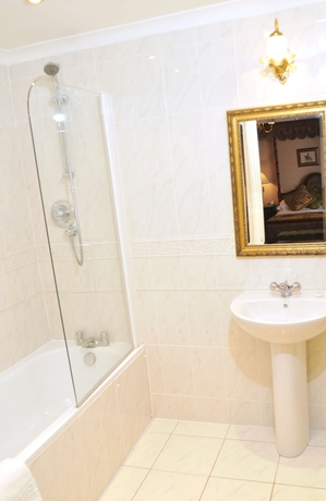 Imagen de la habitación del Hotel Revere Hotel. Foto 14