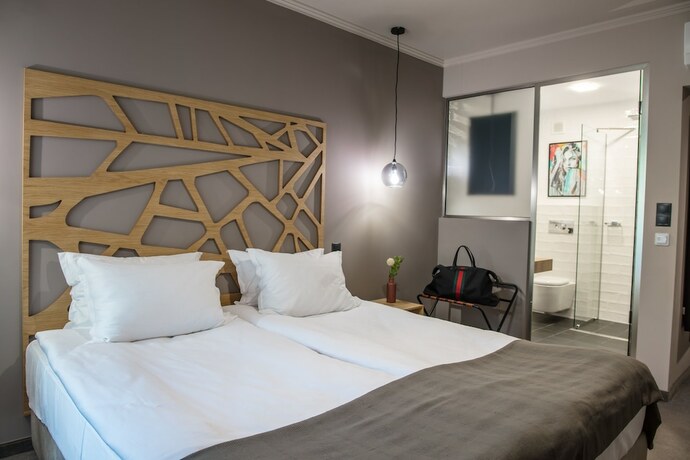 Imagen de la habitación del Hotel Reverence. Foto 2