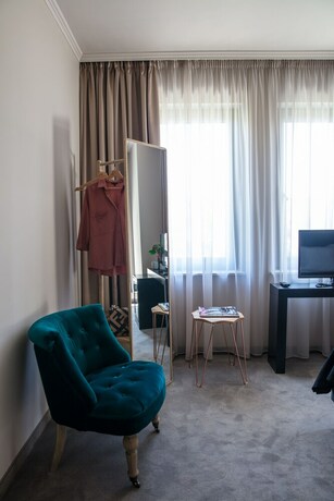 Imagen de la habitación del Hotel Reverence. Foto 15