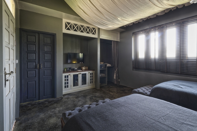 Imagen de la habitación del Hotel Reverie Siam Resort. Foto 7