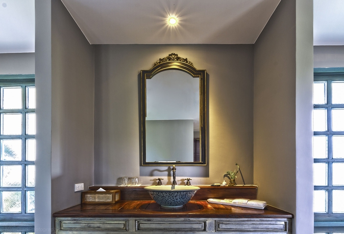 Imagen de la habitación del Hotel Reverie Siam Resort. Foto 9