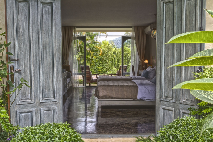 Imagen de la habitación del Hotel Reverie Siam Resort. Foto 11