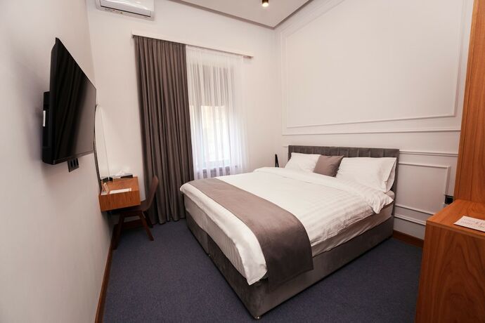 Imagen de la habitación del Hotel Revive Boutique. Foto 19