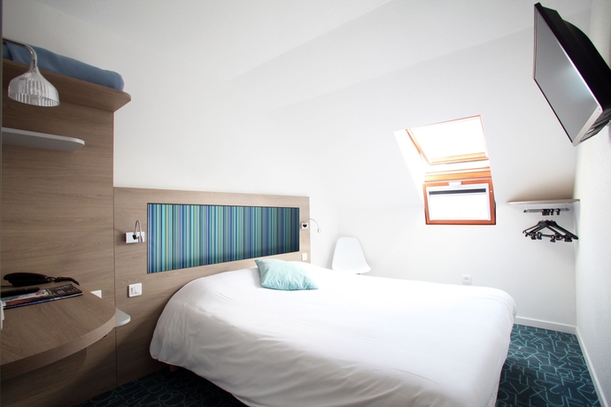 Imagen de la habitación del Hotel Revotel. Foto 5