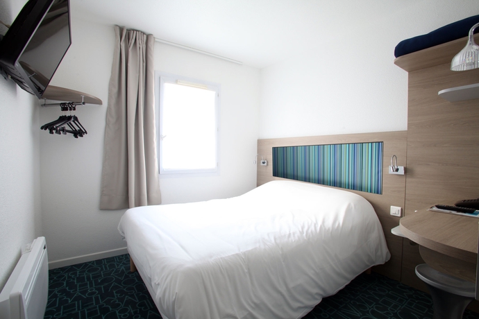 Imagen de la habitación del Hotel Revotel. Foto 6