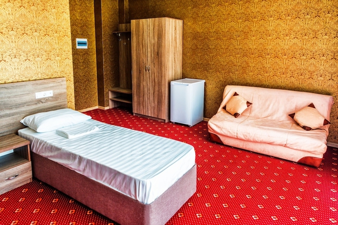 Imagen de la habitación del Hotel Revu. Foto 6