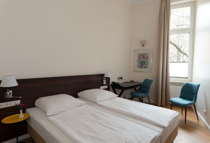 Imagen de la habitación del Hotel Rewari Berlin. Foto 13