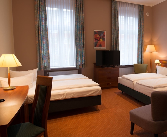 Imagen de la habitación del Hotel Rewari Berlin. Foto 17