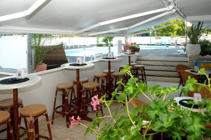 Imagen de la piscina del Hotel Rex, Lignano Sabbiadoro. Foto 16