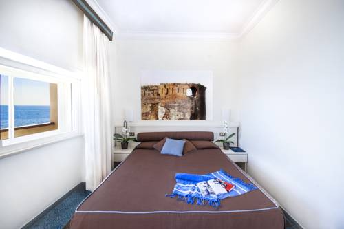 Imagen de la habitación del Hotel Rex, Livorno. Foto 12