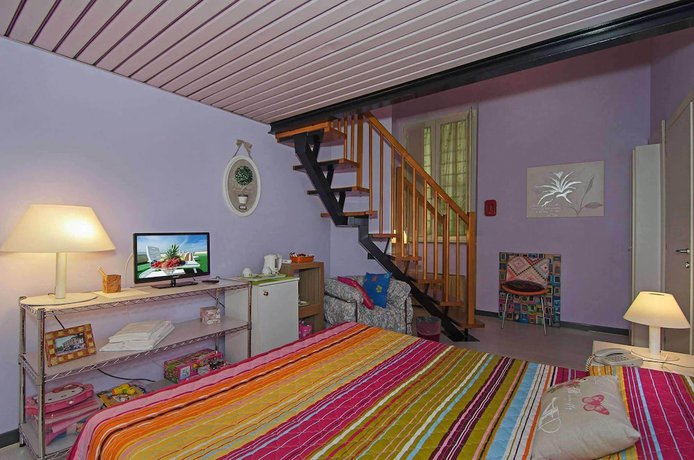 Imagen de la habitación del Hotel Rex, Lucca. Foto 2