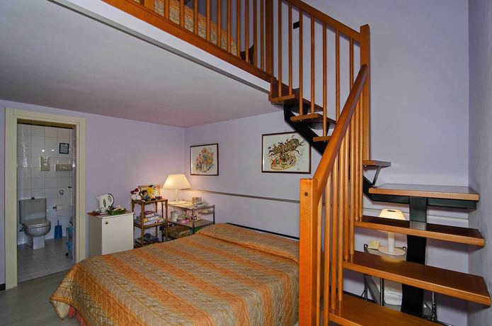 Imagen de la habitación del Hotel Rex, Lucca. Foto 3