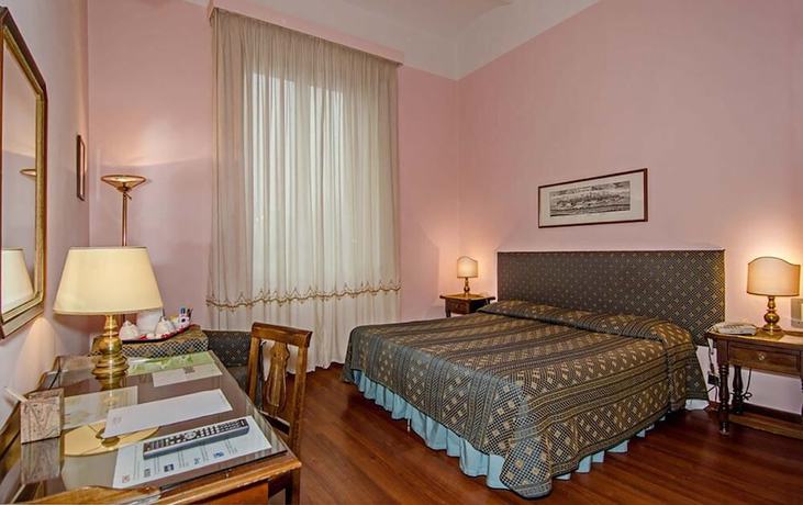 Imagen de la habitación del Hotel Rex, Lucca. Foto 5