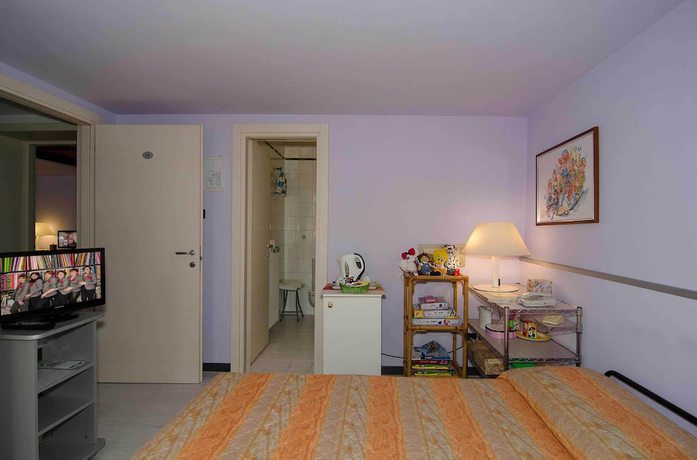 Imagen de la habitación del Hotel Rex, Lucca. Foto 9