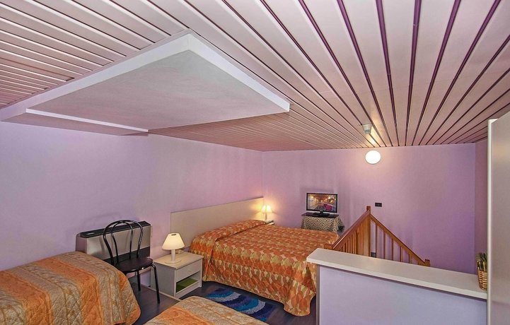 Imagen de la habitación del Hotel Rex, Lucca. Foto 10