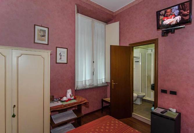 Imagen de la habitación del Hotel Rex, Lucca. Foto 12